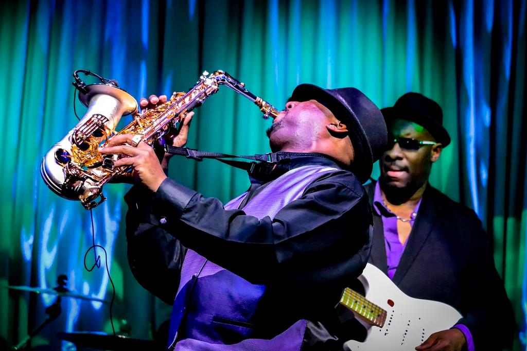 Intimate jazz performance in dimly lit lounge setting